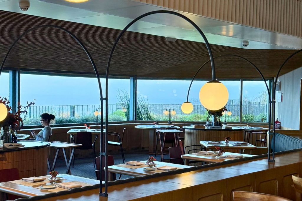 Espacio Oteiza restaurant with sea views at dawn, Akelarre Hotel