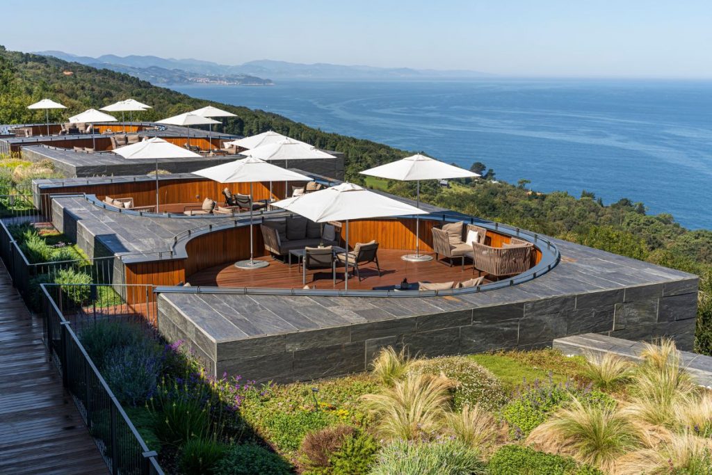 Green roof terrace overlooking the Cantabrian Sea, Akelarre's sustainable architecture, San Sebastián